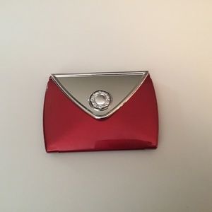 Two mirrored compact